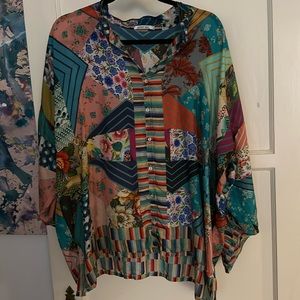 Johnny was button-down, extra large blouse, long sleeves